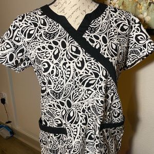 Used women’s scrub top. Great condition. Size small. 100% cotton.